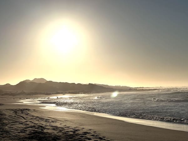 Sonnenaufgang am Strand von Cape St Francis